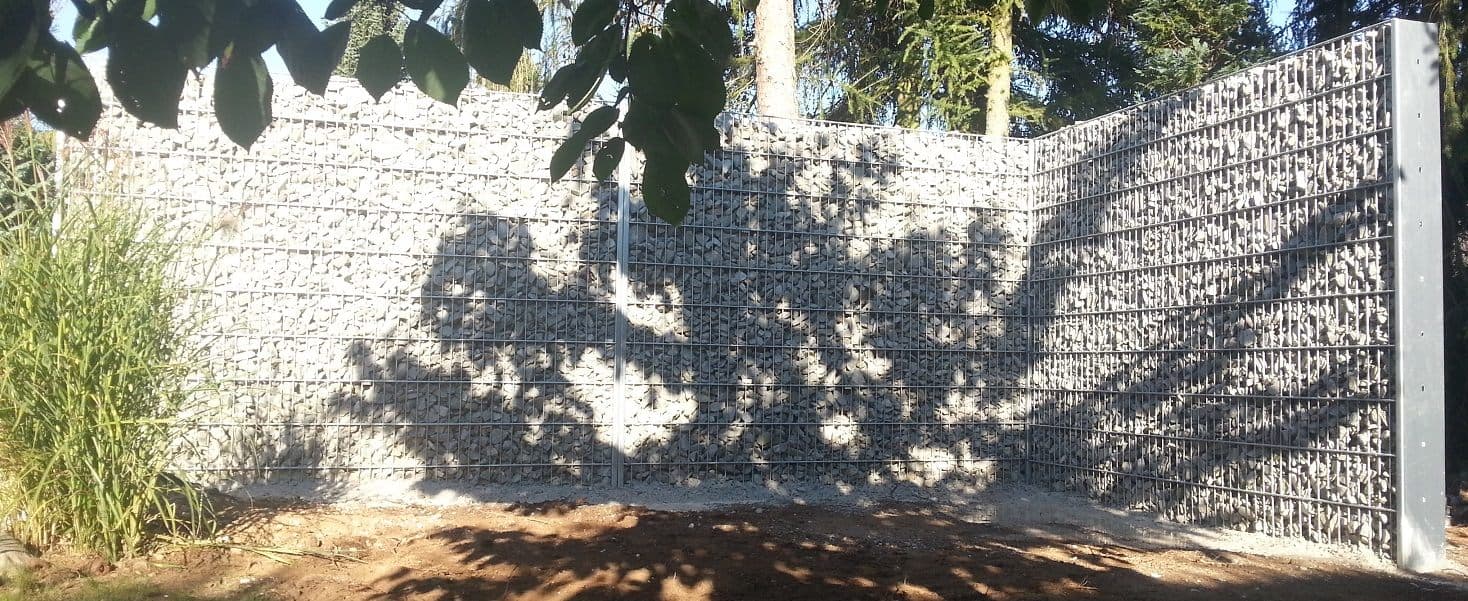 Gabionenwand als Grundstücksbegrenzung